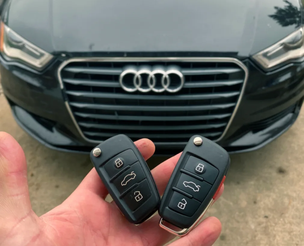 Professional key cutting and programming equipment used for smart key emergencies in Boca Raton
